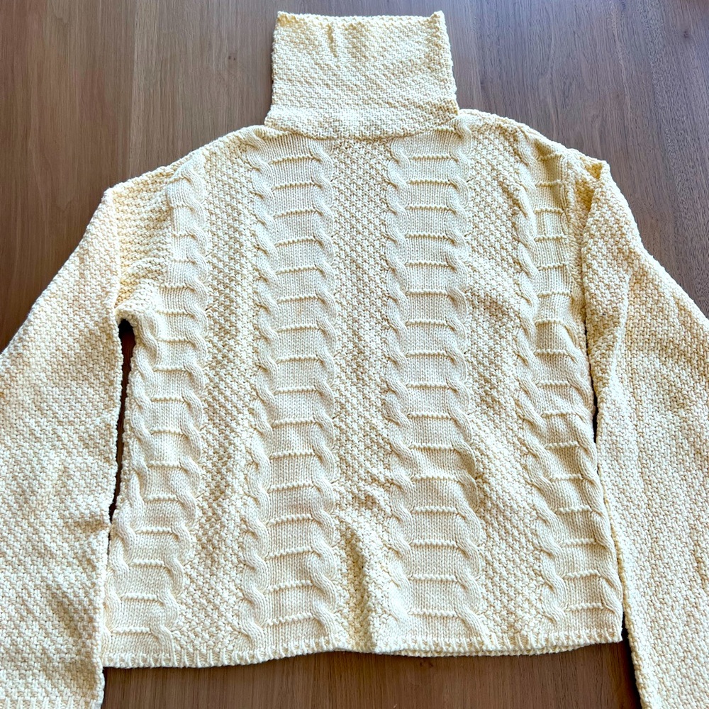 A Knitch Above turtle neck sweater